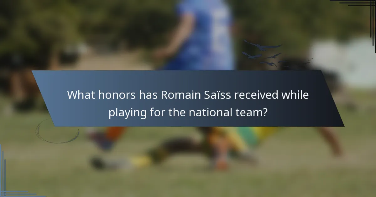 What honors has Romain Saïss received while playing for the national team?